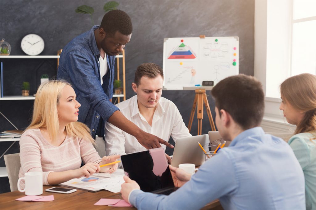company coworkers discussing ideas